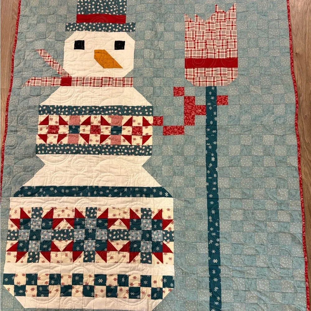 Handmade Snowman Quilt with Red and Blue Accents